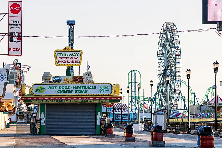 The Seaside Heights boardwalk with its amusement rides and storefronts.