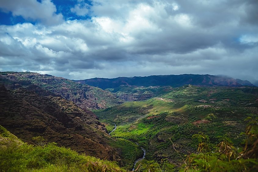 Stormy clouds over the beginnings of Waimea Canyon on the Hawaiian Island of Kauai