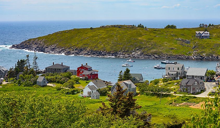 Homes along the water on a summer day on Monhegan Island Maine
