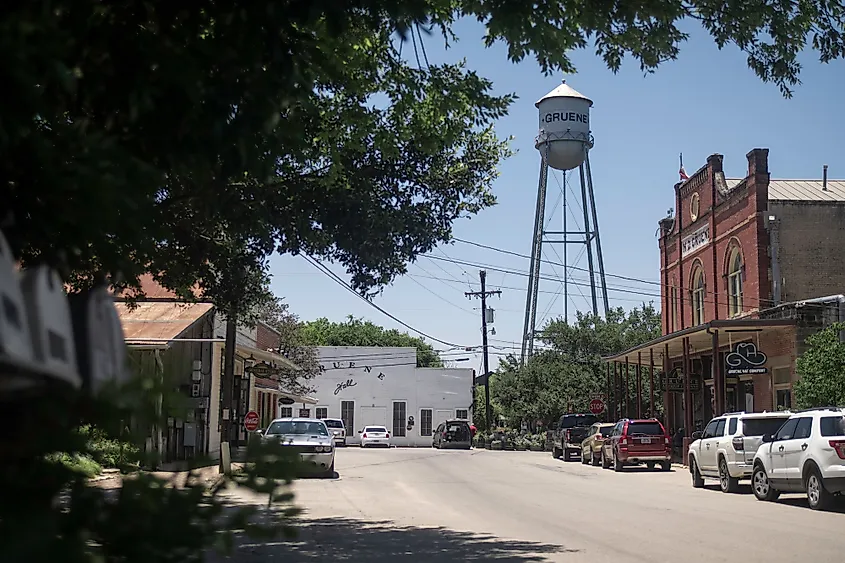 Downtown shops with a water tower and dance hall in Gruene, Texas.