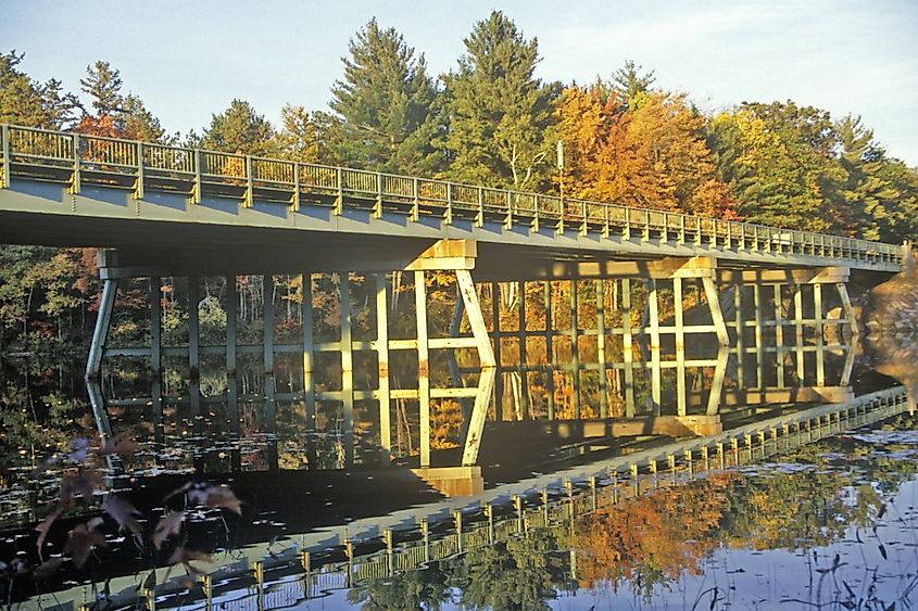 Scenic route in New Hampshire on Route 153 and 25 with bridge over water