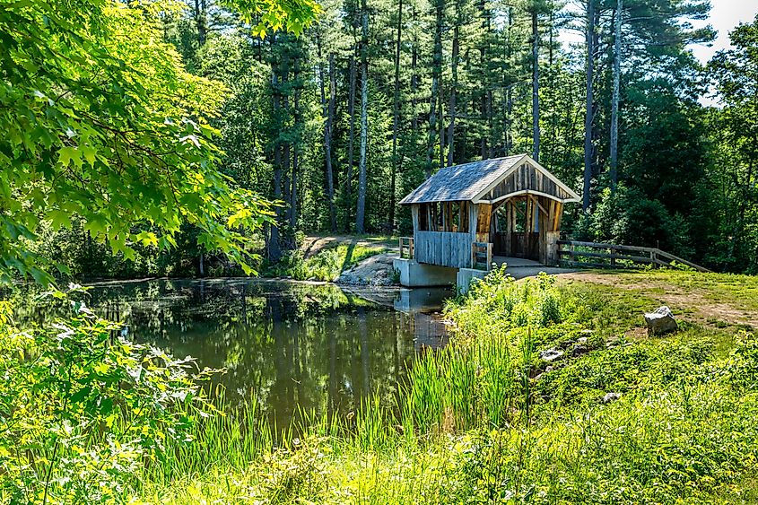 A Pratt through truss pedestrian covered bridge at the Wason Recreational Area in Chester, New Hampshire.