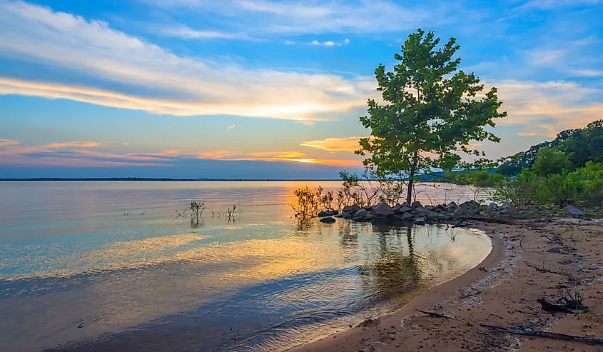 The sandy shores of Lake Eufaula at sunset in Oklahoma