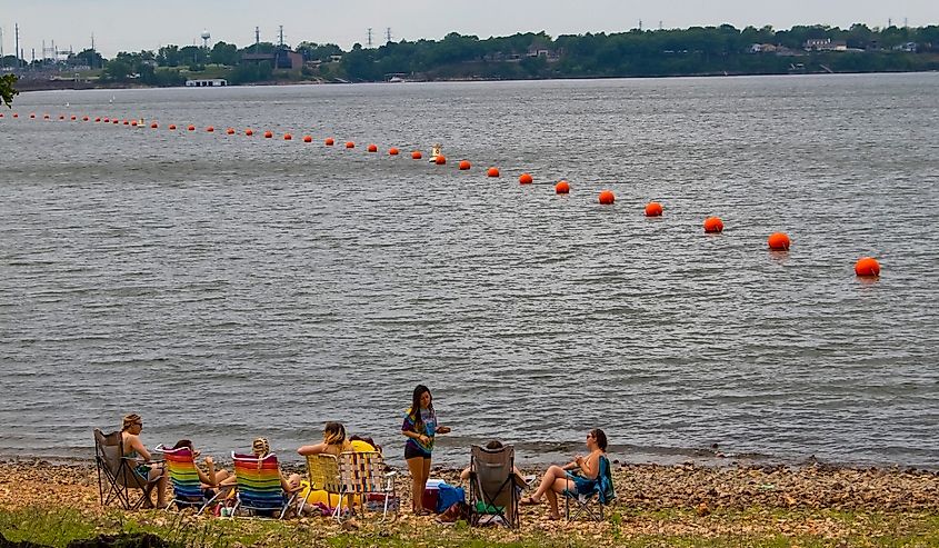 Women sitting by the lake at Grand Lake, Oklahoma.