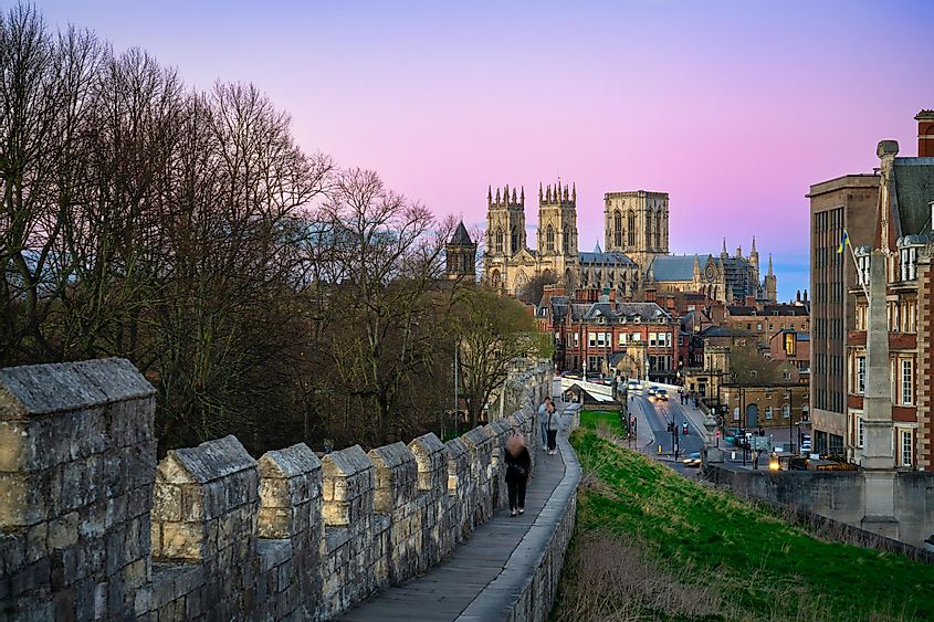 The city of York in England with its medieval wall and the York Minster at sunset