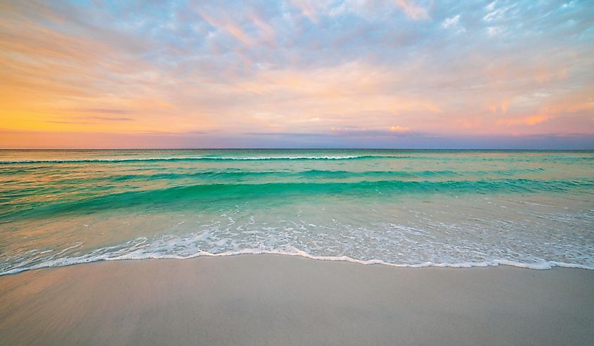 Destin, Florida beach during morning sunrise.