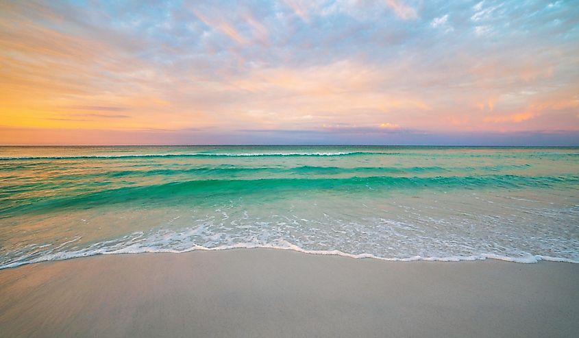 Destin, Florida beach during morning sunrise.