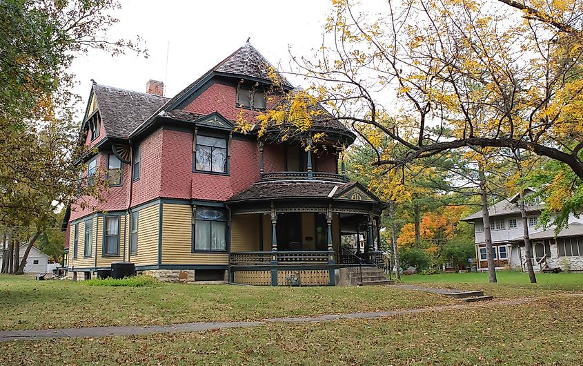 Coffeyville, Kansas, United States - November 4, 2021: a large and colorful Victorian-era mansion in the fall.