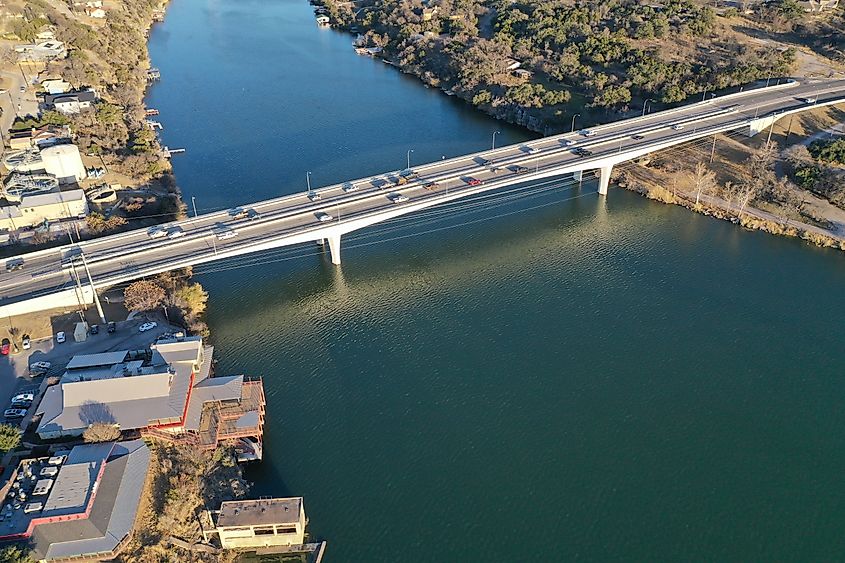 An aerial shot of the lake marble falls reservoir during the day in Texas