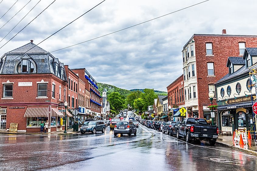 Busy street lined with buildings in Camden, Maine.