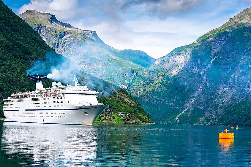Cruise ship in fjord near Geiranger, Norway.