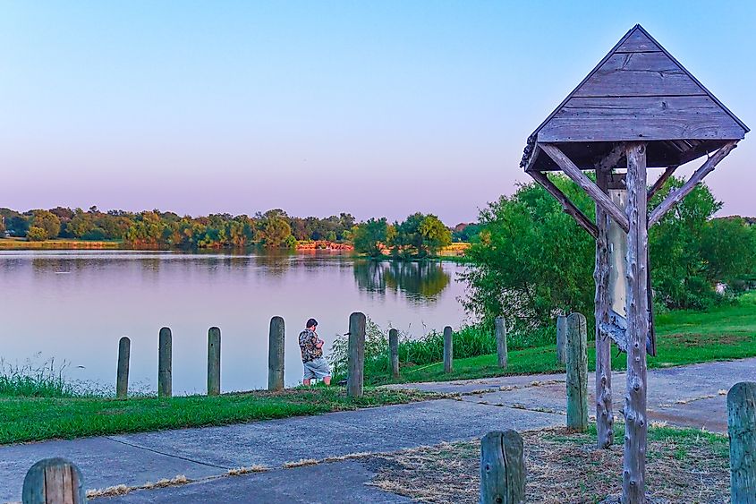 Sulphur Springs, Texa, USA - October 5, 2019 - Fishing in the park on an early fall evening.