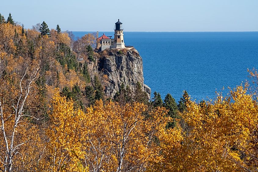 Autumn fall leaves with Split Rock Lighthouse in the distance on Lake Superior Minnesota