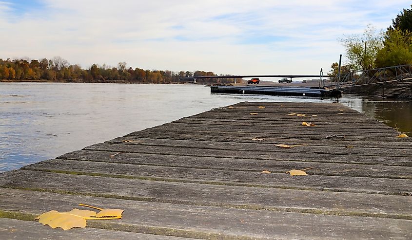 Wooden dock with leaves on the Missouri River in Washington Missouri