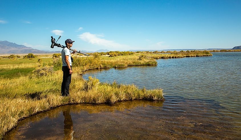 A nature conservancy staff member on the shore of Borax Lake in the Alvord basin near the community of Fields, Oregon