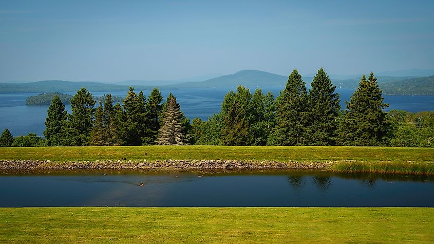 Rangeley Lake State Park and its tranquil lakescape with a view of Bald Mountain in western Maine