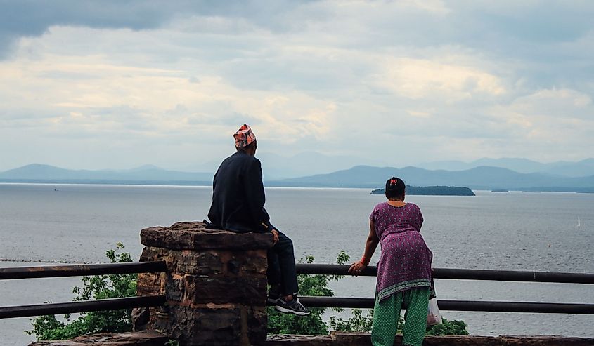Couple observe Lake Champlain from Waterfront Park