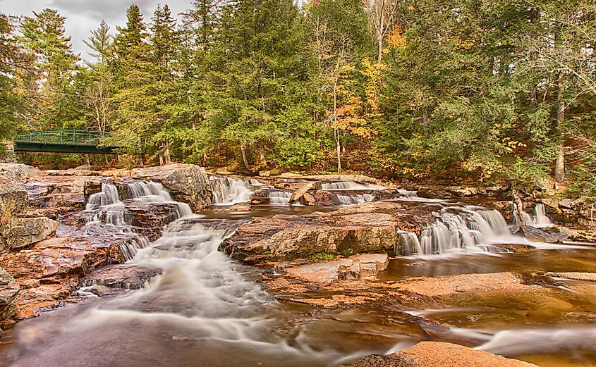 Jackson Falls with Autumn color, New Hampshire.