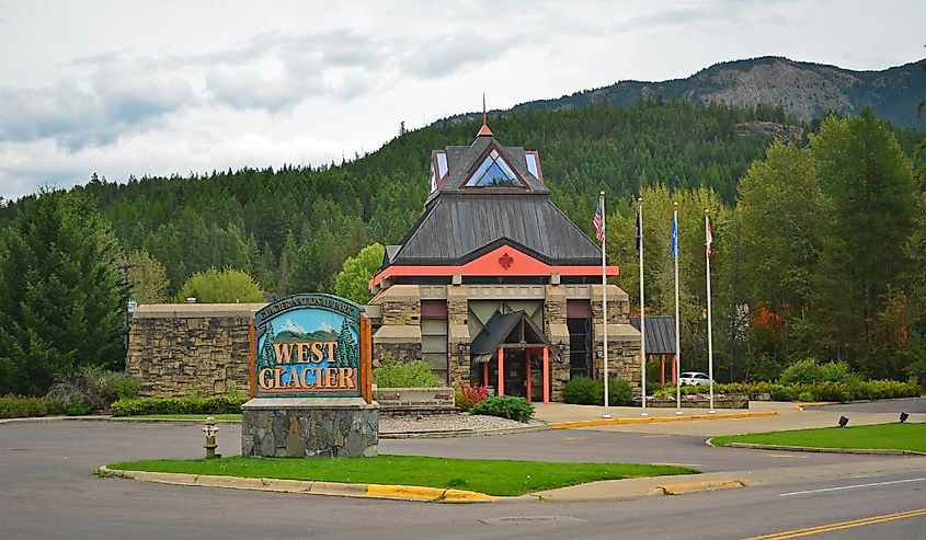 West Glacier, Montana, sign and mountains