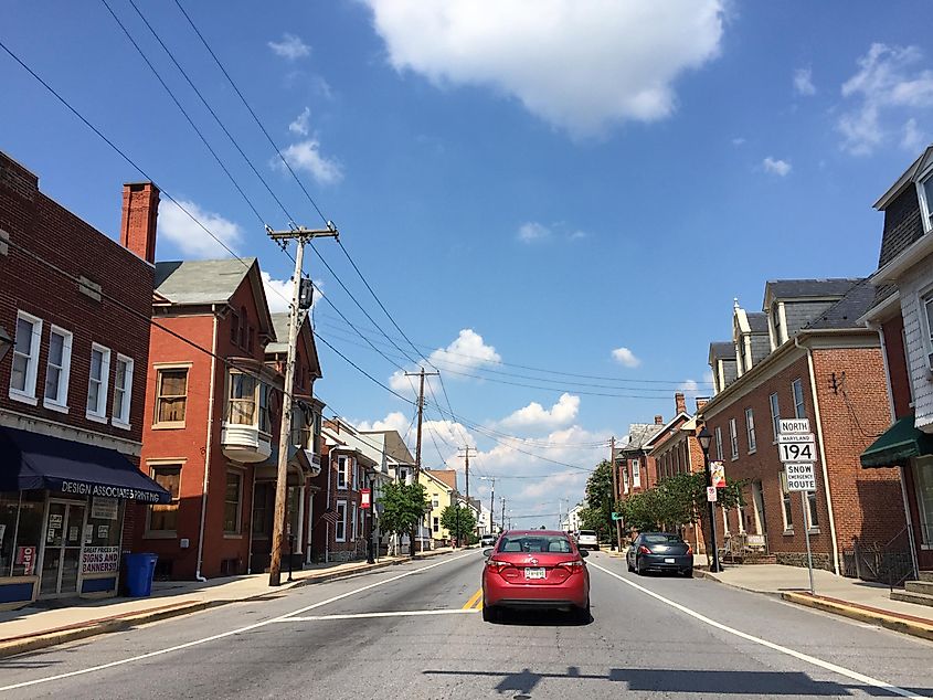 View north along Maryland State Route 194 (York Street) at Maryland State Route 140 (Baltimore Street) in Taneytown, Carroll County, Maryland