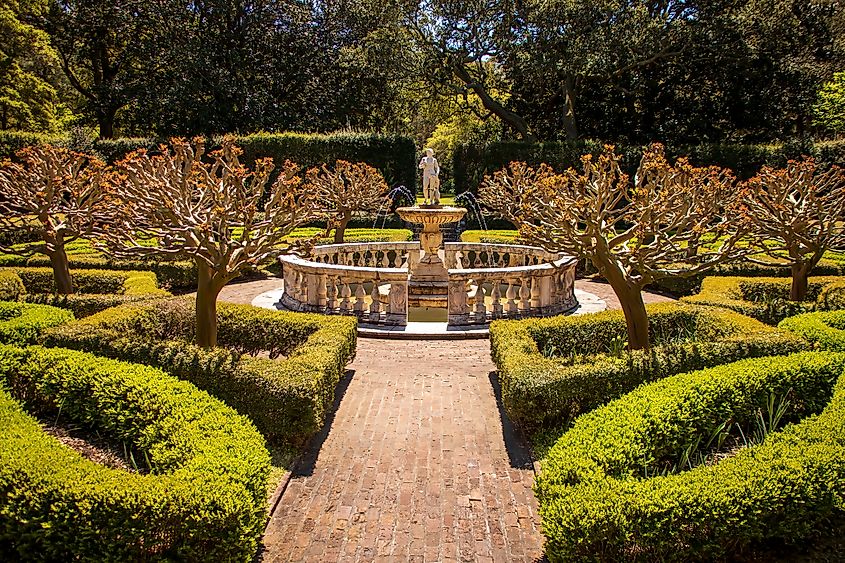 Sculptures at the Fort Raleigh Elizabethan Gardens in Manteo, North Carolina. Image by Jason Schronce via Shutterstock.