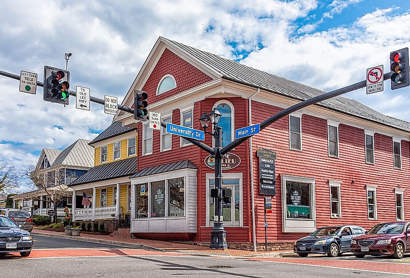 Old town downtown intersection with stores and restaurants in Fairfax, Virginia.