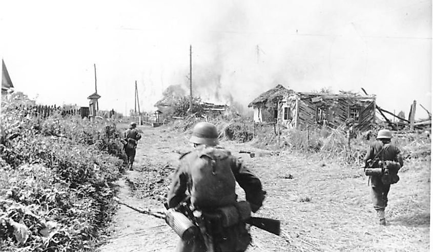 Men from a German forward detachment attack a Soviet village west of Kiev, in August 1941