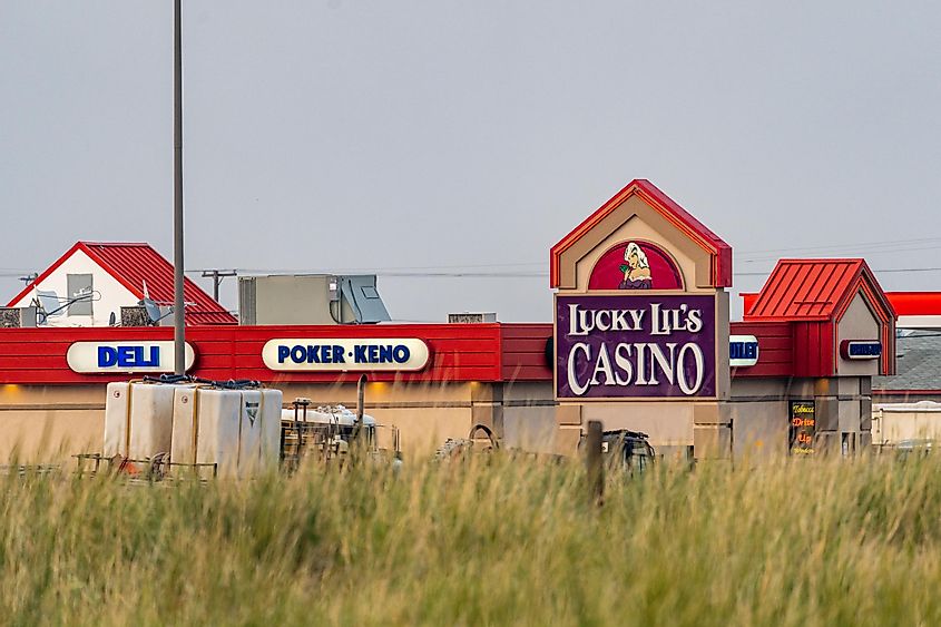  A Lucky Lils Casino sign at a Towne Pump Gas Station, via melissamn / Shutterstock.com