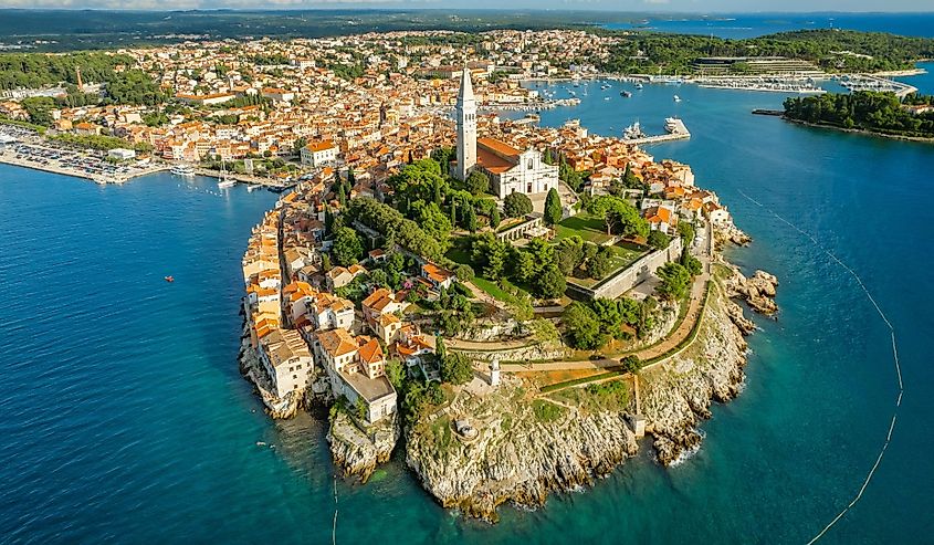 Aerial view of the Rovinj old town at sunset, famous ancient Croatian city at the Adriatic sea, Istria peninsula, Croatia.