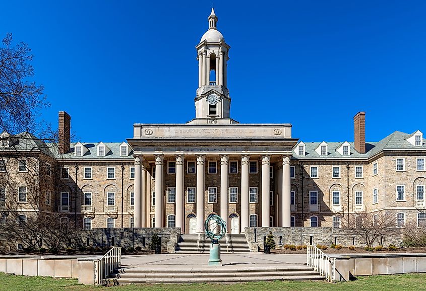 The Old Main building on the campus of Penn State University in sunny day on March 7, 2023 in State College, Pennsylvania.