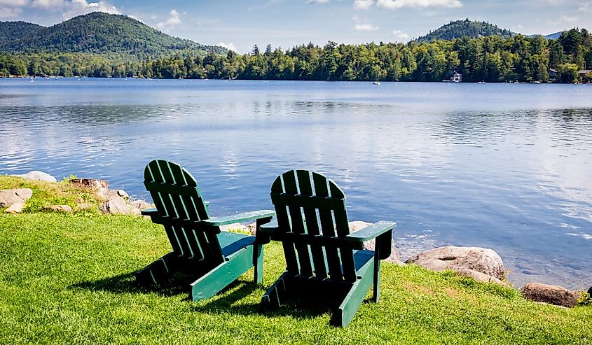 Adirondack chairs. Mirror Lake, Lake Placid New York. Summer, vacation, outdoors, travel, explore, nature, camping, lake and mountain vacation concept
