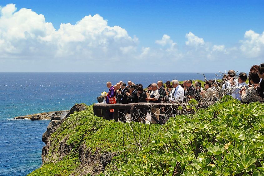 Members of the Ninpou Shinto Buddhist denomination praying at Banzai Cliff, Saipan. 