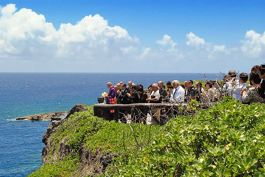 Members of the Ninpou Shinto Buddhist denomination praying at Banzai Cliff, Saipan. 