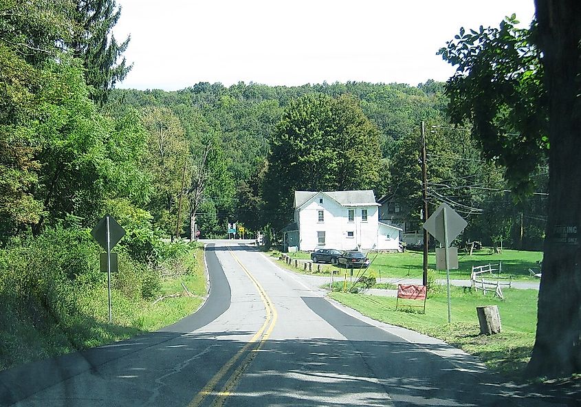 Photo of northbound Pennsylvania Route 715 approaching its northern terminus at PA 191 in the Paradise Township, Pennsylvania village of Henryville.