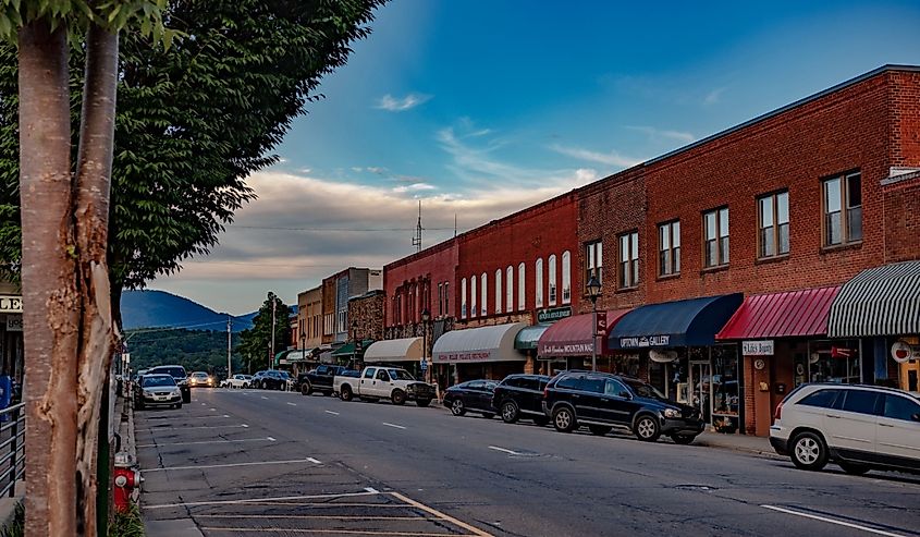 Downtown Franklin at dusk. A row of historic buildings with various small businesses