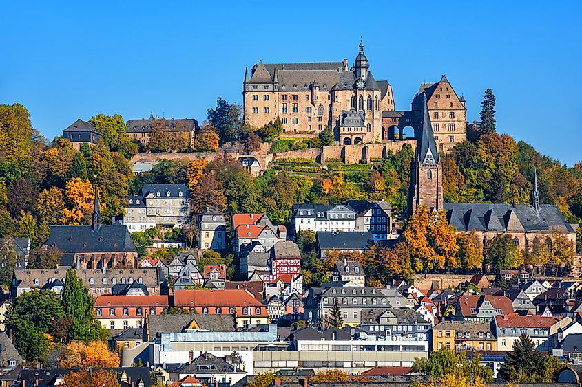 The hillside old town of Marburg with half-timbered houses below the Marburg Castle.