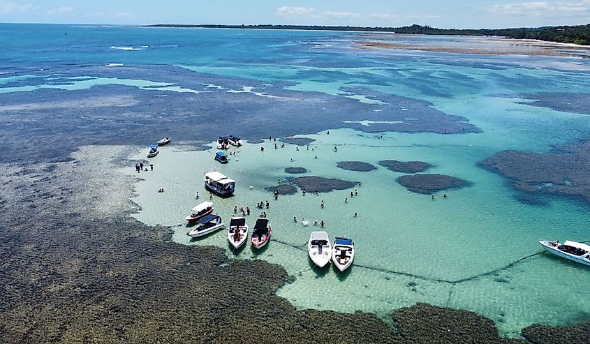 Natural pools of Morerè in Morro de Sao Paolo, Brazil. Incredible natural formations, crystal clear water, floating boats