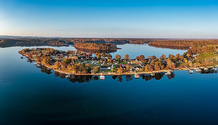 High resolution aerial view panorama of lakefront homes, boat docks and beautiful autumn colorful foliage on Tims Ford Lake, in Shasteen Bend, Winchester Tennessee