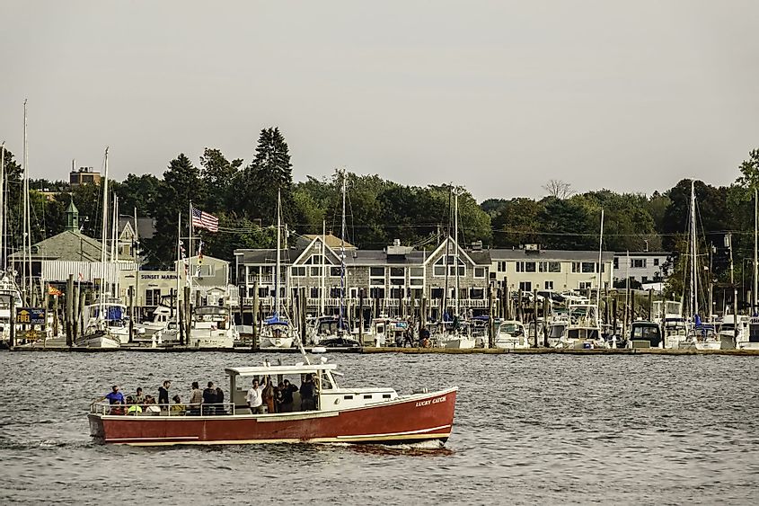 Tour boat Lucky Catch takes passengers past Sunset Marina on an afternoon sightseeing cruise in Casco Bay