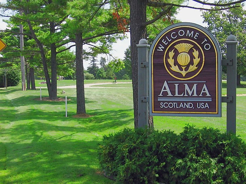 A sign welcoming visitors to "Scotland, USA" (Alma, Michigan).