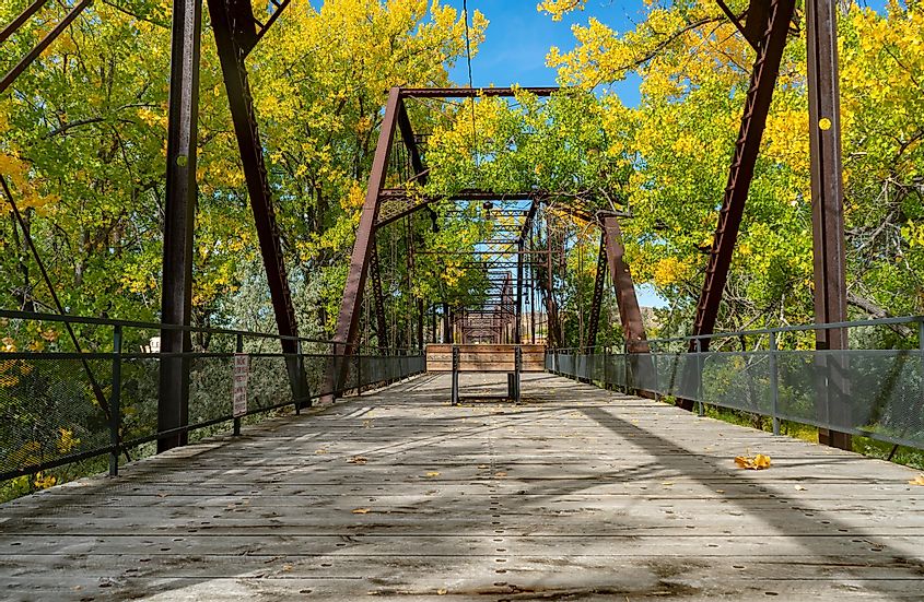 Old bridge with fall colors in Fort Benton, Montana.