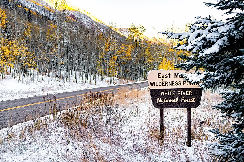 Maroon Bells sign for wilderness portal and White River National Forest in Aspen, Colorado