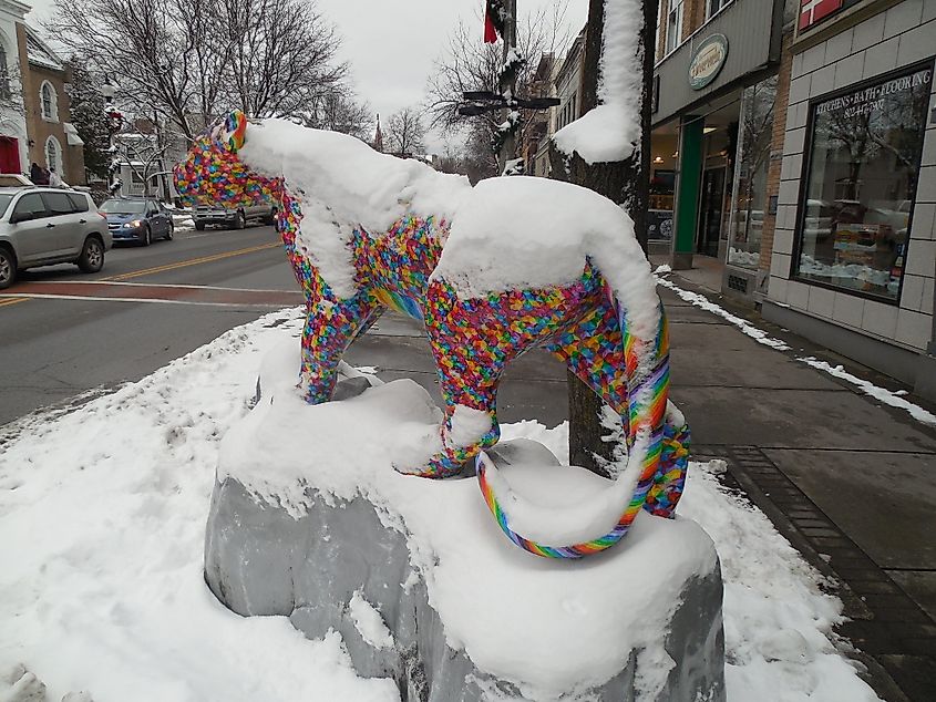 Snow-covered, colorful catamount art installation in Bennington, Vermont.