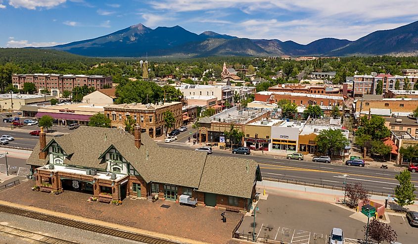 Traffic makes it's way past the train station along route 66 in Flagstaff, Arizona