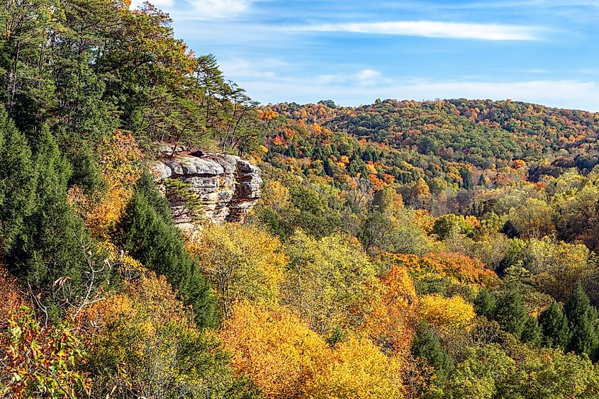 The southwestern Ohio autumn landscape is painted with the colors of fall leaves as viewed high above the trees and rock walls of Conkle’s Hollow in the beautiful Hocking Hills