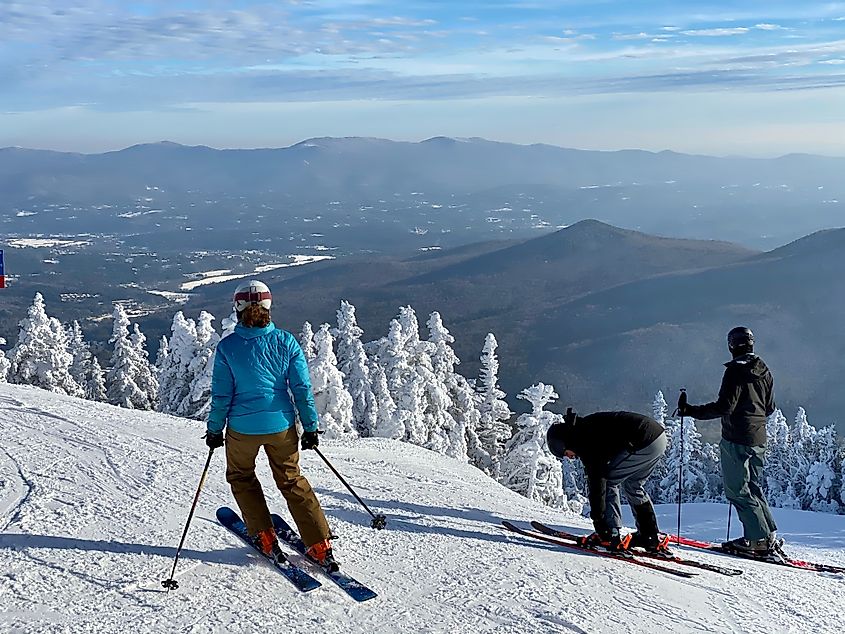 Skiers enjoying skiing on the ski slopes of Stowe, Vermont.