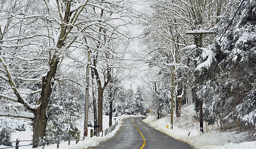 An empty road after a March snowfall in Chester, Connecticut.