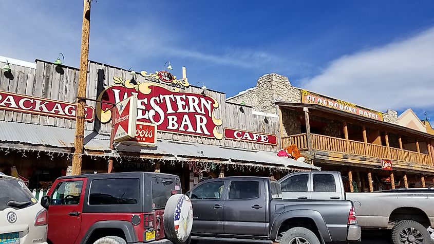 Cloudcroft, New Mexico, cars parked in front of vintage-style stores.