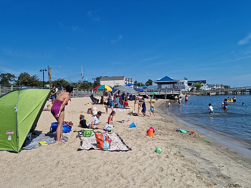 People enjoying the beachside in North Beach, Maryland
