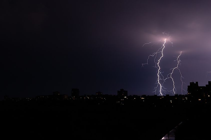 Lightning strikes in the dead of night. Via Shutterstock / Bespalov Serhii